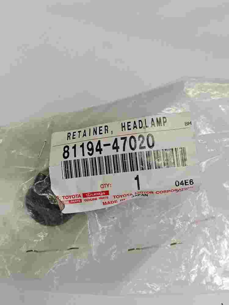 Retainer Headlamp Protector Upper LH Toyota Prius 8119447020 81194-47020