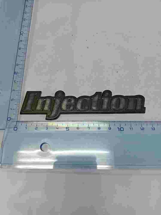 Emblem  Renault R21 İnjection 13cm. 7700774567 7700 774 567