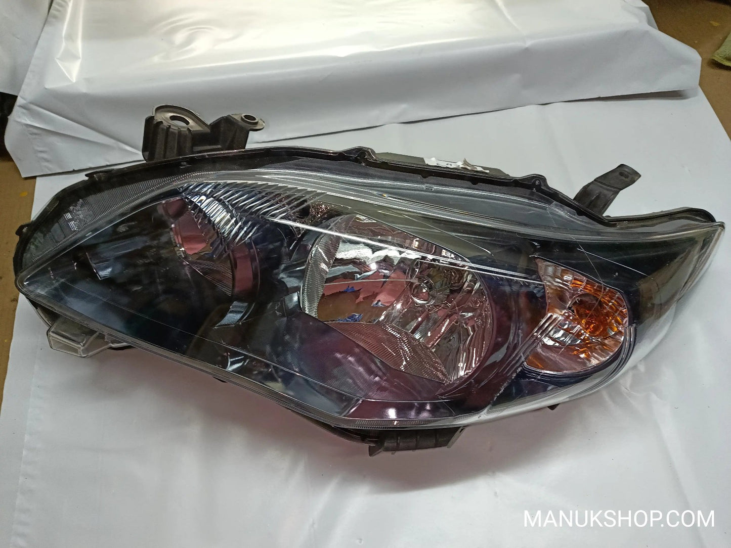 Scheinwerfer links Toyota Corolla  E140 E150 ARTEB 02-202