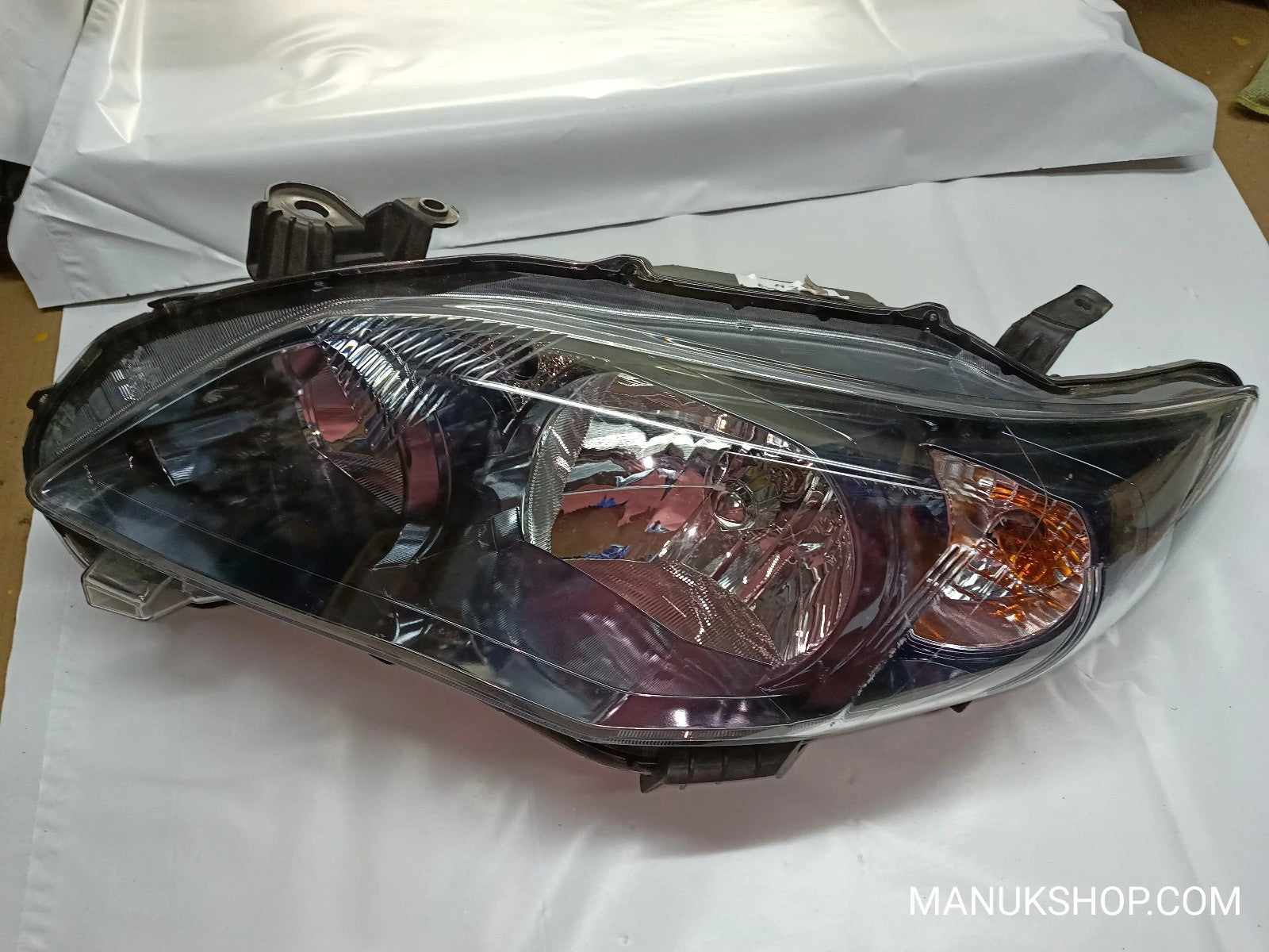 Scheinwerfer links Toyota Corolla  E140 E150 ARTEB 02-202