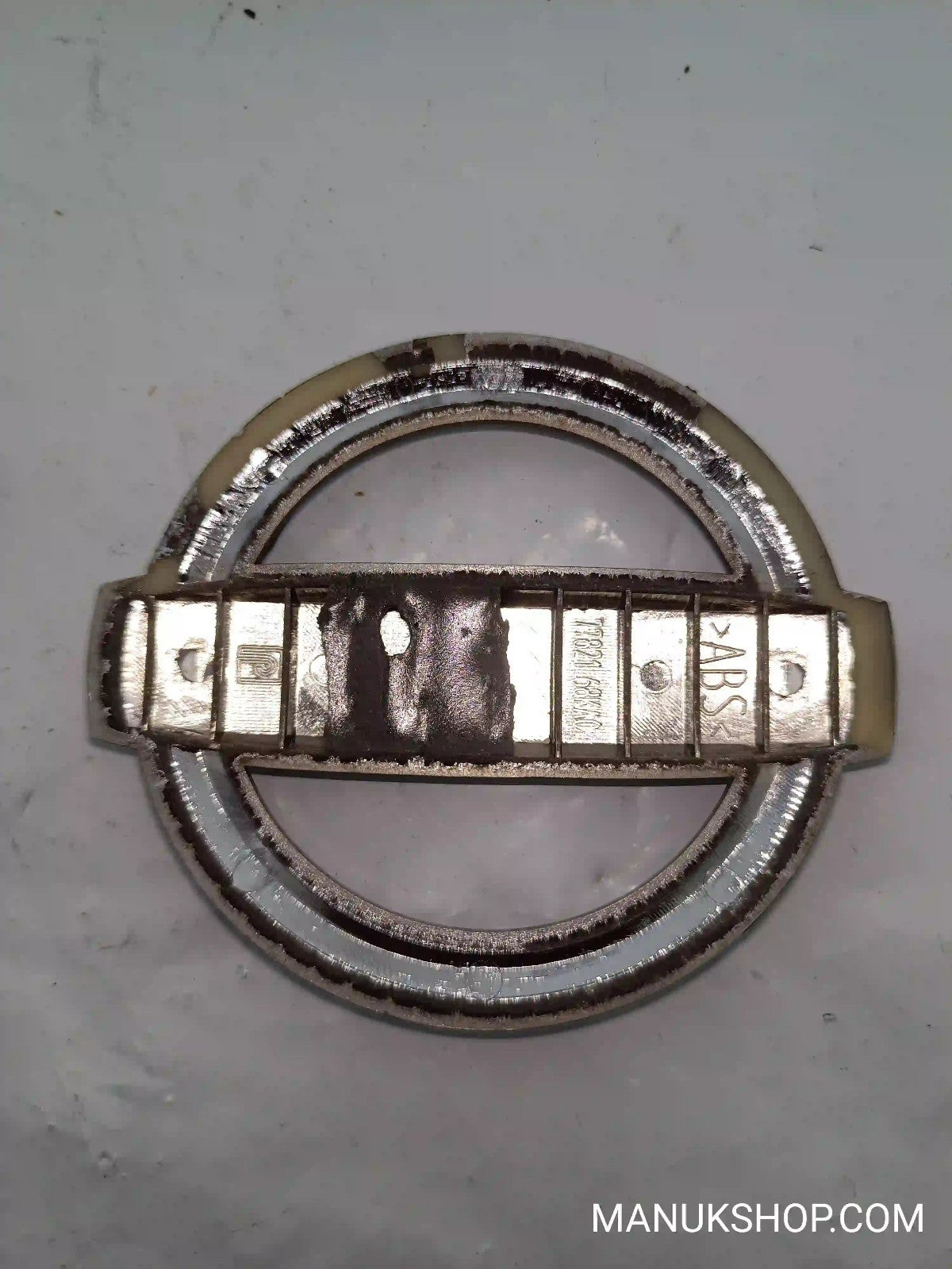 Emblem Nissan Pixo Almera Tino 7782168KA0 7782 168 KA0
