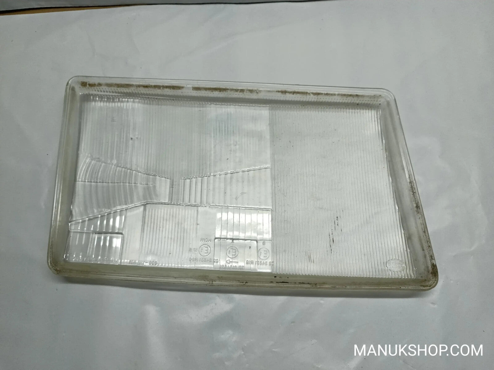 Scheinwerfer GLAS  links Mercedes-Benz E W24 008129571 008-129 571