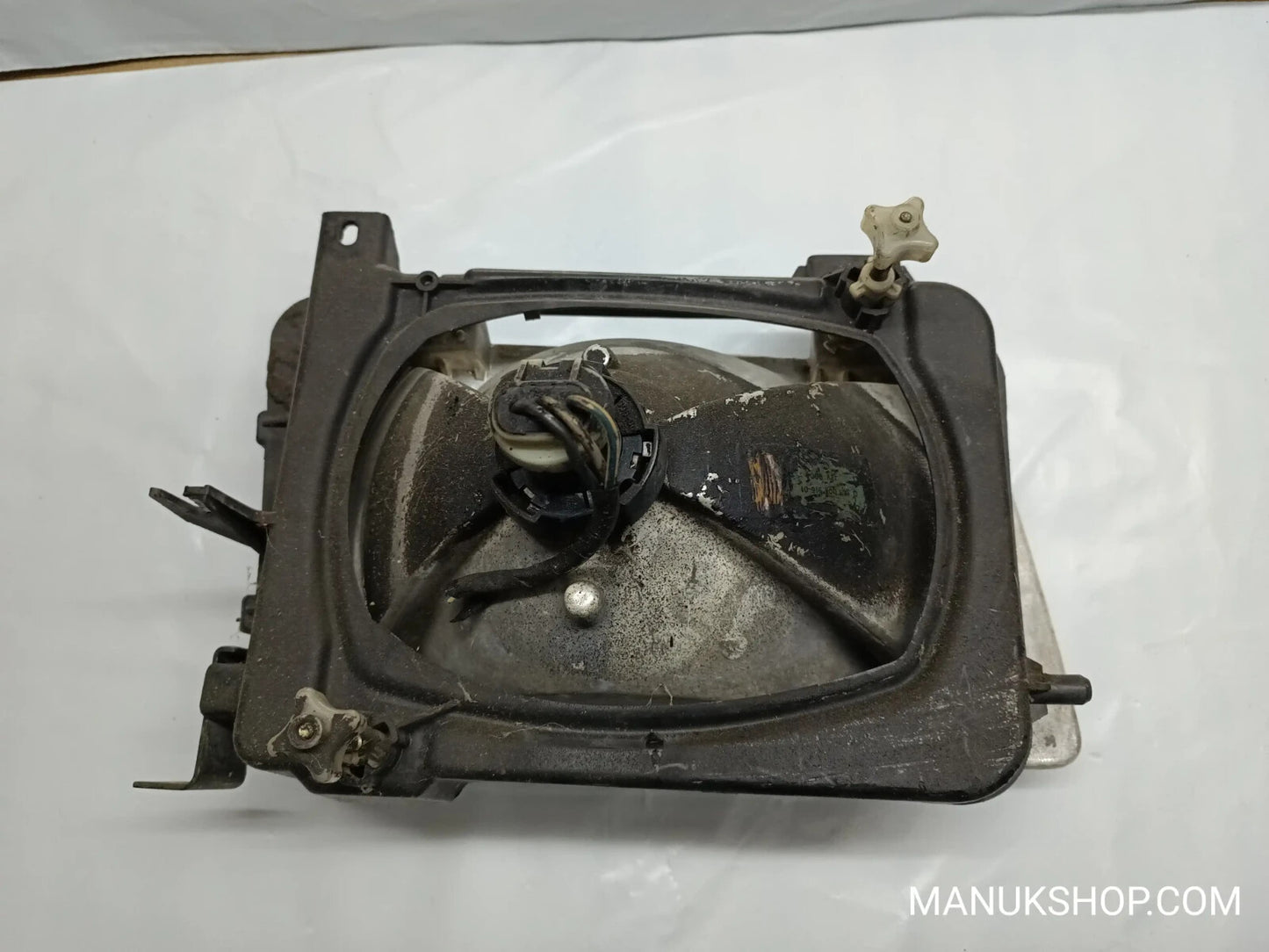 Scheinwerfer links Volkswagen VW T4 Hella DOT 301130771 301-130 771