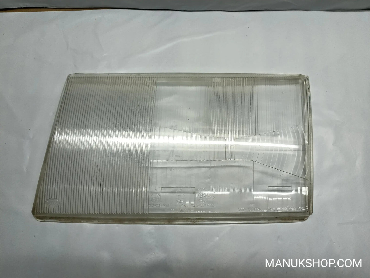 Scheinwerfer GLAS  links Mercedes-Benz E W24 008129571 008-129 571