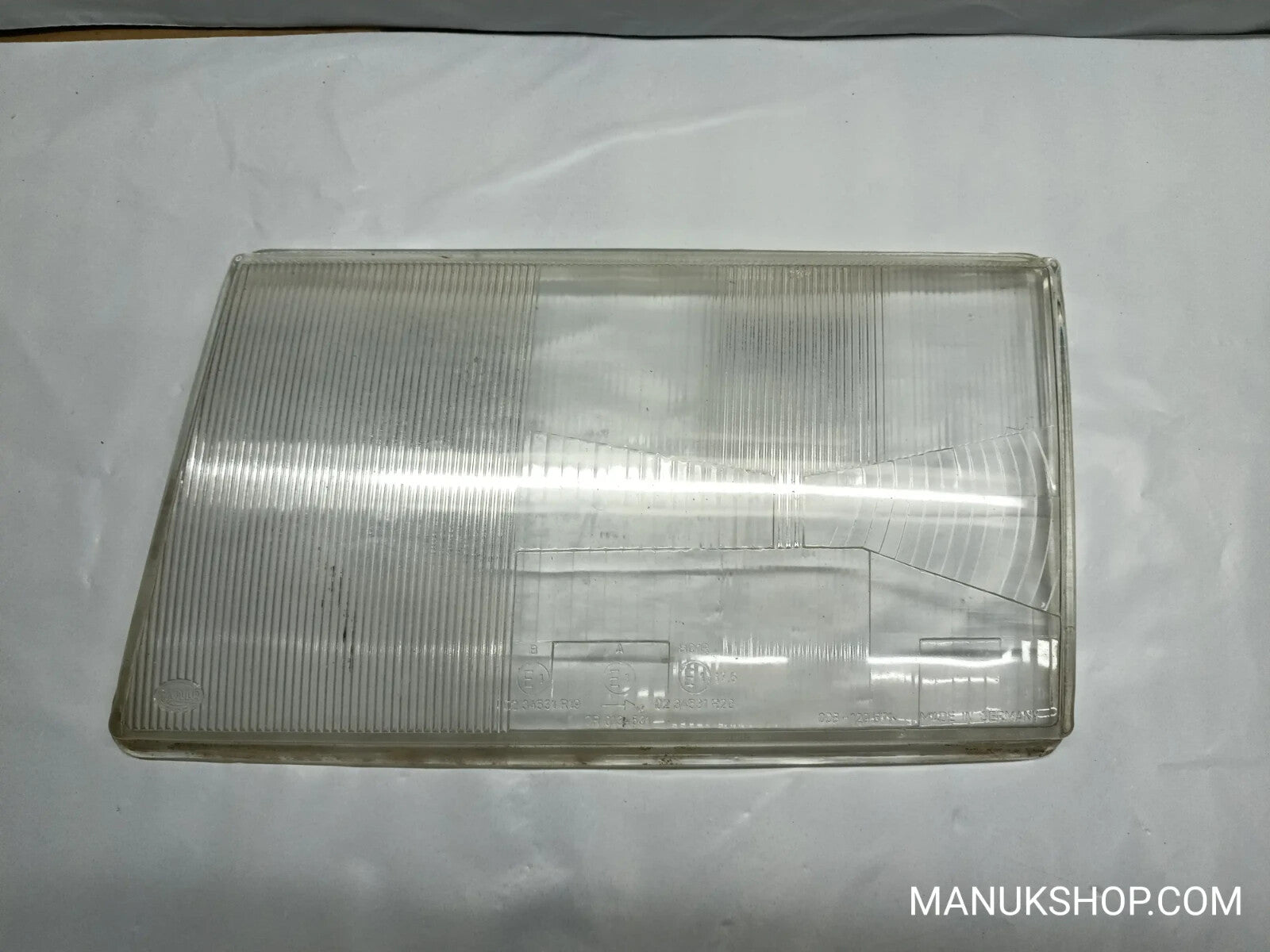 Scheinwerfer GLAS  links Mercedes-Benz E W24 008129571 008-129 571