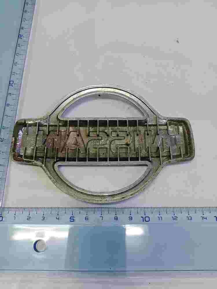 Emblem  Nissan Almera 628904M500 62890-4M500 13cm.