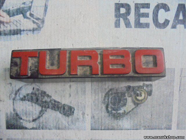Emblem Logo Nissan Terrano WD21 Ford Maverick TURBO 6289785G10