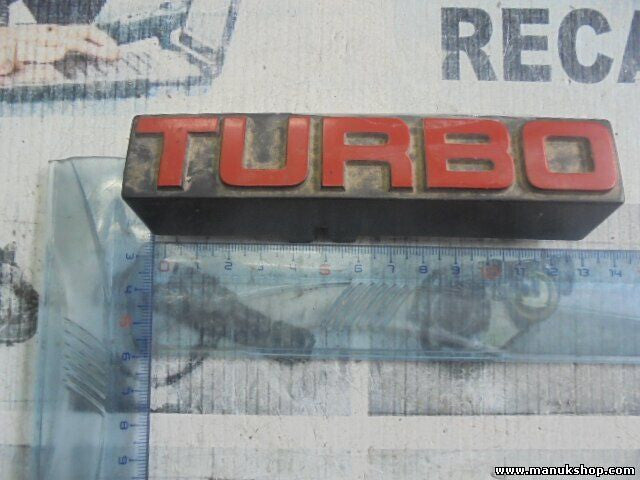 Emblem Logo Nissan Terrano WD21 Ford Maverick TURBO 6289785G10