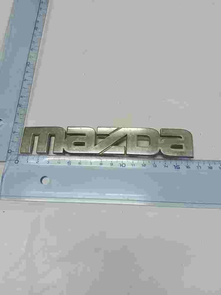 Emblem Mazda Premacy 16.5cm. C10051710 C100 51-710 C100-517-10