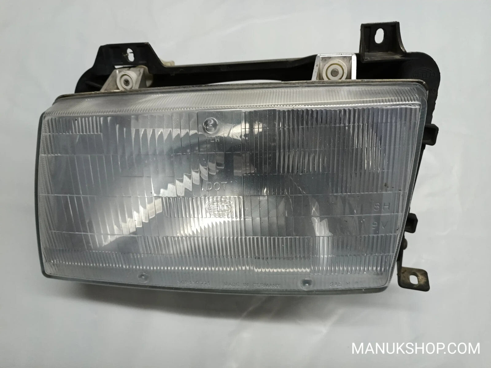 Scheinwerfer links Volkswagen VW T4 Hella DOT 301130771 301-130 771