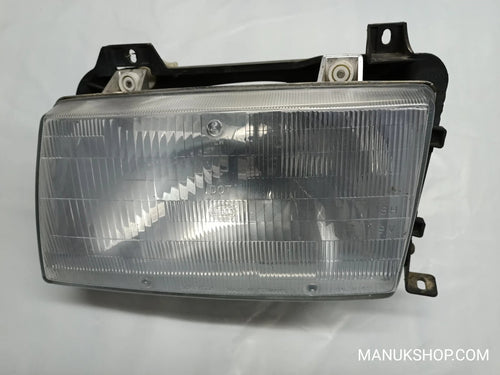 Scheinwerfer links Volkswagen VW T4 Hella DOT 301130771 301-130 771